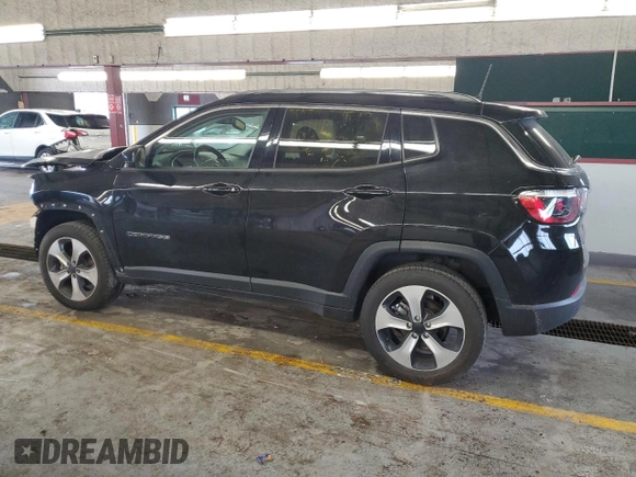 2020 Jeep Compass Latitude with VIN 3C4NJDBB3LT258349, listed as a Copart auction lot 61452715 with 80,933 mi miles and Salvage title. Bid and sale history available at DreamBid. Image 2.