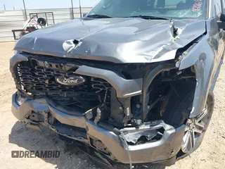 2021 Ford F-150 XL with VIN 1FTEW1CP2MKF04739, listed as a IAAI auction lot 42264990 with 87,711 mi miles and . Bid and sale history available at DreamBid. Image 6.