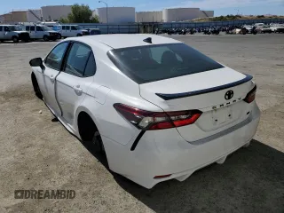 2023 Toyota Camry SE with VIN 4T1G11AK6PU115976, listed as a Copart auction lot 61074124 with 11,022 mi miles and Clean Title. Bid and sale history available at DreamBid. Image 2.