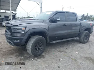 2022 Ram 1500 TRX with VIN 1C6SRFU98NN334983, listed as a IAAI auction lot 42010145 with 19,207 mi miles and . Bid and sale history available at DreamBid. Image 2.