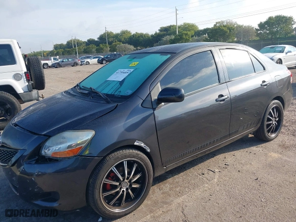 2010 Toyota Yaris with VIN JTDBT4K34A1377764, listed as a IAAI auction lot 41759405 with 154,226 mi miles. Bid and sale history available at carsss.com. Image 17.