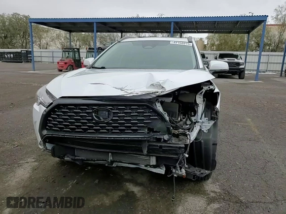 2023 Toyota Corolla Cross LE z VIN 7MUBAAAG5PV037601, wystawiony jako Copart lot #49168915 z przebiegiem 24 175 mil mil oraz Szkoda całkowita • Salvage title. Historia ofert i sprzedaży dostępna na DreamBid. Obrazek 15.