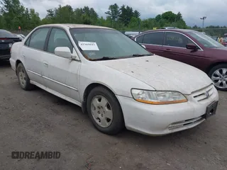 2001 Honda Accord EX z VIN 1HGCG16591A053150, wystawiony jako IAAI lot #42365043 z przebiegiem 263 431 mil mil oraz . Historia ofert i sprzedaży dostępna na DreamBid. Obrazek 1.