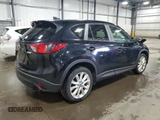 2014 Mazda CX-5 Grand Touring with VIN JM3KE4DY0E0322606, listed as a Copart auction lot 54381815 with 216,022 mi miles and Salvage Title. Bid and sale history available at DreamBid. Image 3.