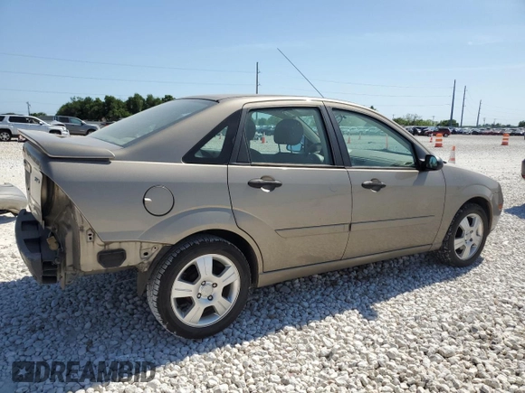 2005 Ford Focus S with VIN 1FAFP34N45W154248, listed as a Copart auction lot 52541945 with 55,062 mi miles and Salvage Title. Bid and sale history available at carsss.com. Image 3.