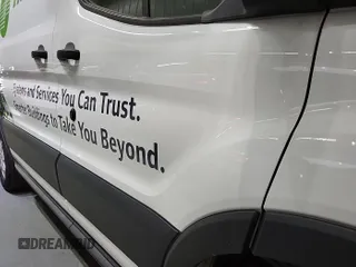 2018 Ford Transit z VIN 1FTYR1YG7JKB47664, wystawiony jako IAAI lot #42298402 z przebiegiem 114 262 mil mil oraz . Historia ofert i sprzedaży dostępna na DreamBid. Obrazek 1.