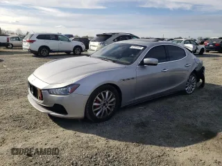 2014 Maserati Ghibli z VIN ZAM57XSA3E1105712, wystawiony jako Copart lot #47751435 z przebiegiem 88 432 mil mil oraz Szkody całkowita. Historia ofert i sprzedaży dostępna na DreamBid. Obrazek 1.