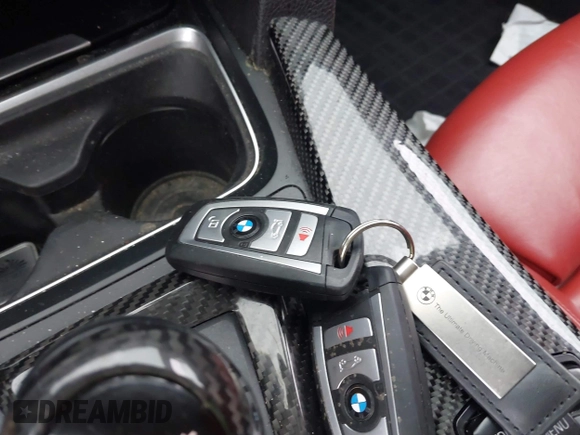 2017 BMW M4 with VIN WBS3U9C55HP970922, listed as a IAAI auction lot 41405271 with 61,953 mi miles. Bid and sale history available at carsss.com. Image 11.