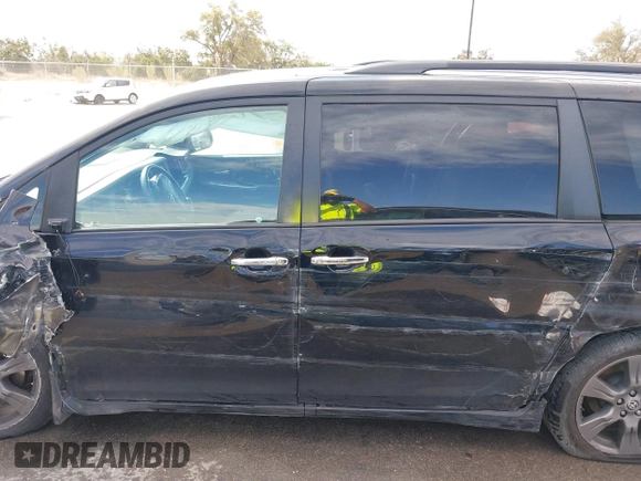 2020 Toyota Sienna SE with VIN 5TDXZ3DC7LS062183, listed as a IAAI auction lot 41791032 with 80,760 mi miles. Bid and sale history available at carsss.com. Image 14.