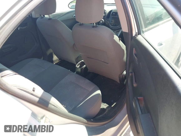 2013 Chevrolet Sonic LS with VIN 1G1JA5SH1D4246936, listed as a IAAI auction lot 42665664 with 124,464 mi miles and . Bid and sale history available at DreamBid. Image 8.