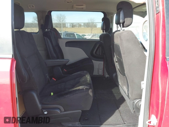 2014 Dodge Grand Caravan SXT with VIN 2C4RDGCG6ER477008, listed as a IAAI auction lot 41770610 with 89,843 mi miles and . Bid and sale history available at DreamBid. Image 8.