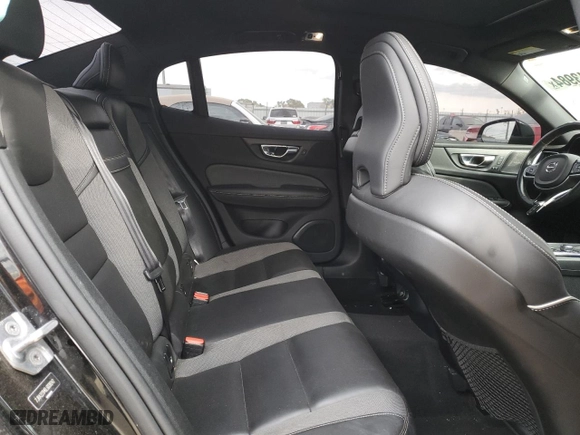 2020 Volvo S60 R-Design with VIN 7JRA22TM6LG038242, listed as a Copart auction lot 77043984 with 103,382 mi miles and Salvage Title. Bid and sale history available at carsss.com. Image 10.