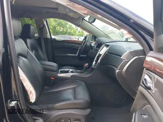 2015 Cadillac SRX Premium Collection z VIN 3GYFNGE36FS626641, wystawiony jako IAAI lot #42532380 z przebiegiem 178 799 mil mil oraz . Historia ofert i sprzedaży dostępna na DreamBid. Obrazek 5.