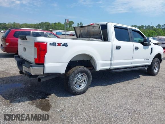 2017 Ford Super Duty F-250 SRW Lariat with VIN 1FT7W2BT6HEF43514, listed as a IAAI auction lot 41101292 with 396,099 mi miles. Bid and sale history available at carsss.com. Image 4.