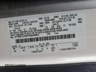 2023 Ford Transit Cargo с VIN 1FTBR1C8XPKB44983, выставлен на аукционе Copart как лот 63350635 с пробегом 73 083 миль миль и Списание • Salvage title. История ставок и продаж доступна на DreamBid. Изображение 14.