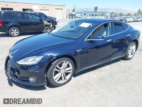 2014 Tesla Model S 60 with VIN 5YJSA1H12EFP46760, listed as a IAAI auction lot 42344596 with 106,252 mi miles and . Bid and sale history available at DreamBid. Image 17.