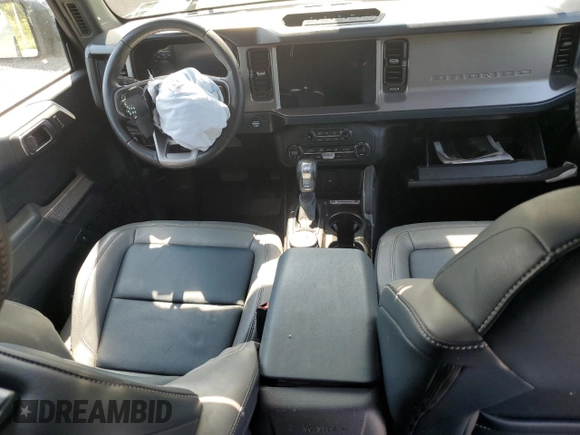 2023 Ford Bronco z VIN 1FMEE5DP7PLB60568, wystawiony jako Copart lot #62118915 z przebiegiem 25 681 mil mil oraz Nie do naprawy • Non repairable. Historia ofert i sprzedaży dostępna na DreamBid. Obrazek 8.