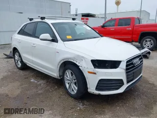 2018 Audi Q3 Premium with VIN WA1BCCFS1JR010439, listed as a IAAI auction lot 41641231 with 108,605 mi miles. Bid and sale history available at carsss.com. Image 1.