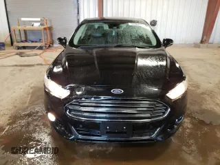 2014 Ford Fusion Titanium Hybrid z VIN 3FA6P0RUXER168706, wystawiony jako Copart lot #55362295 z przebiegiem 136 382 mil mil oraz Czysty tytuł • Clean title. Historia ofert i sprzedaży dostępna na DreamBid. Obrazek 5.