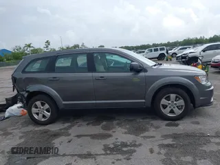 2013 Dodge Journey SE with VIN 3C4PDCAB6DT529949, listed as a IAAI auction lot 42609006 with 38,202 mi miles and . Bid and sale history available at DreamBid. Image 14.