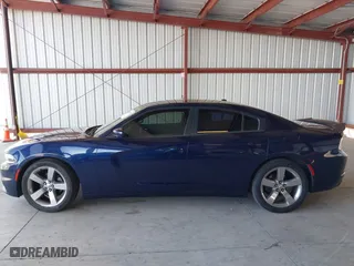 2015 Dodge Charger SE with VIN 2C3CDXBG2FH835787, listed as a IAAI auction lot 42069235 with 119,805 mi miles. Bid and sale history available at carsss.com. Image 14.