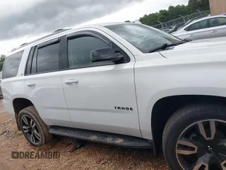 2018 Chevrolet Tahoe LT z VIN 1GNSKBKC9JR132670, wystawiony jako IAAI lot #42248273 z przebiegiem 136 636 mil mil oraz . Historia ofert i sprzedaży dostępna na DreamBid. Obrazek 13.