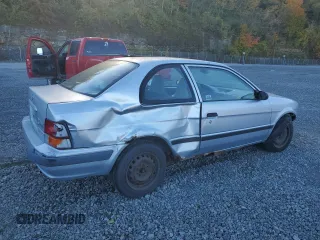 1997 Toyota Tercel CE z VIN JT2AC52L1V0227973, wystawiony jako Copart lot #77300554 z przebiegiem 301 799 mil mil oraz Szkoda całkowita • Salvage title. Historia ofert i sprzedaży dostępna na DreamBid. Obrazek 3.