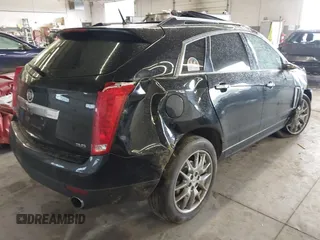 2014 Cadillac SRX Premium Collection with VIN 3GYFNGE35ES636852, listed as a IAAI auction lot 42283604 with 167,983 mi miles and . Bid and sale history available at DreamBid. Image 4.