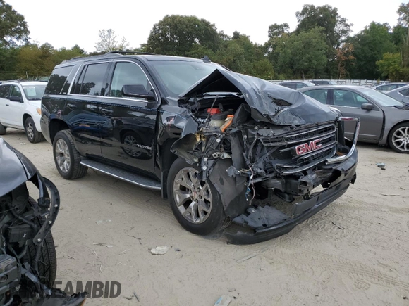 2017 GMC Yukon SLT with VIN 1GKS2BKC2HR406007, listed as a Copart auction lot 71702084 with 66,828 mi miles and Salvage Title. Bid and sale history available at carsss.com. Image 4.