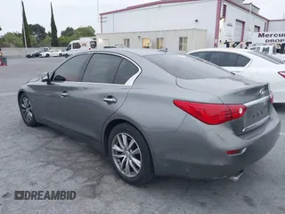 2015 Infiniti Q50 Premium with VIN JN1BV7AP6FM357265, listed as a IAAI auction lot 42104440 with 83,404 mi miles. Bid and sale history available at carsss.com. Image 3.
