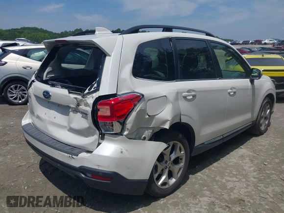 2017 Subaru Forester Touring z VIN JF2SJAWC1HH463163, wystawiony jako IAAI lot #42480107 z przebiegiem 70 337 mil mil oraz . Historia ofert i sprzedaży dostępna na DreamBid. Obrazek 4.