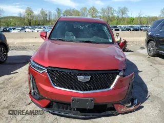 2024 Cadillac XT6 AWD Sport with VIN 1GYKPHRS4RZ715079, listed as a Copart auction lot 55297235 with 18,283 mi miles and Salvage title. Bid and sale history available at DreamBid. Image 5.