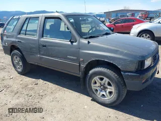 1997 Honda Passport z VIN 4S6CM58V4V4417753, wystawiony jako IAAI lot #42076610 z przebiegiem 211 410 mil mil oraz . Historia ofert i sprzedaży dostępna na DreamBid. Obrazek 1.