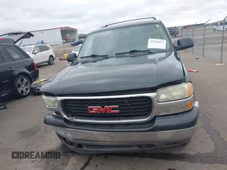 2004 GMC Yukon SLT with VIN 1GKEK13Z24J113954, listed as a IAAI auction lot 41950157 with 174,021 mi miles. Bid and sale history available at carsss.com. Image 13.