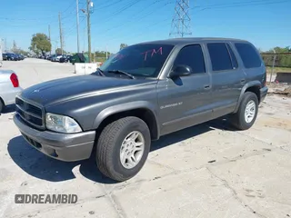 2001 Dodge Durango z VIN 1B4HR28Z11F613523, wystawiony jako IAAI lot #41703743 z przebiegiem 142 828 mil mil oraz . Historia ofert i sprzedaży dostępna na DreamBid. Obrazek 2.