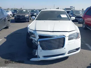 2014 Chrysler 300 S with VIN 2C3CCABG0EH235784, listed as a IAAI auction lot 41345692 with 109,920 mi miles and . Bid and sale history available at DreamBid. Image 12.