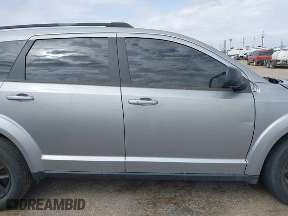2019 Dodge Journey SE z VIN 3C4PDCBB5KT861358, wystawiony jako IAAI lot #41947841 z przebiegiem 82 099 mil mil oraz . Historia ofert i sprzedaży dostępna na DreamBid. Obrazek 13.