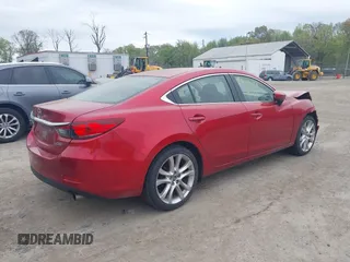 2014 Mazda 6 i Touring with VIN JM1GJ1V63E1156419, listed as a IAAI auction lot 42075808 with 200,811 mi miles. Bid and sale history available at carsss.com. Image 4.