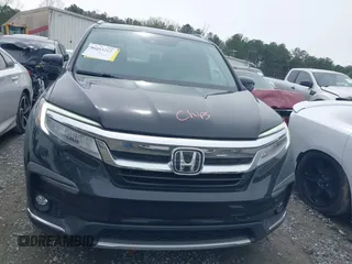 2019 Honda Pilot Touring 7-Passenger z VIN 5FNYF5H66KB027960, wystawiony jako IAAI lot #41863212 z przebiegiem 114 615 mil mil oraz . Historia ofert i sprzedaży dostępna na DreamBid. Obrazek 12.