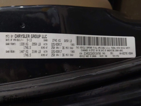 2014 Dodge Grand Caravan SXT with VIN 2C4RDGCGXER154709, listed as a IAAI auction lot 41117603 with 214,872 mi miles and . Bid and sale history available at DreamBid. Image 9.