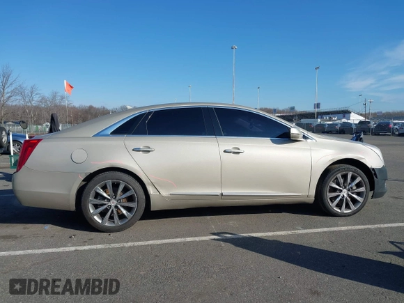 2013 Cadillac XTS Luxury z VIN 2G61R5S31D9185009, wystawiony jako IAAI lot #41243001 z przebiegiem 161 219 mil mil oraz . Historia ofert i sprzedaży dostępna na DreamBid. Obrazek 13.