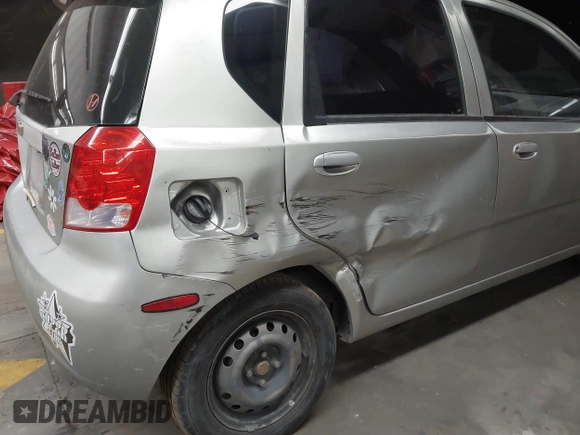 2004 Chevrolet Aveo with VIN KL1TD62624B169038, listed as a IAAI auction lot 41620372 with 101,258 mi miles and . Bid and sale history available at DreamBid. Image 6.