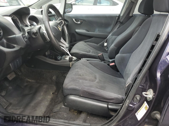 2010 Honda Fit Sport with VIN JHMGE8H44AC013385, listed as a Copart auction lot 63216515 with 228,358 mi miles and Salvage title. Bid and sale history available at DreamBid. Image 7.