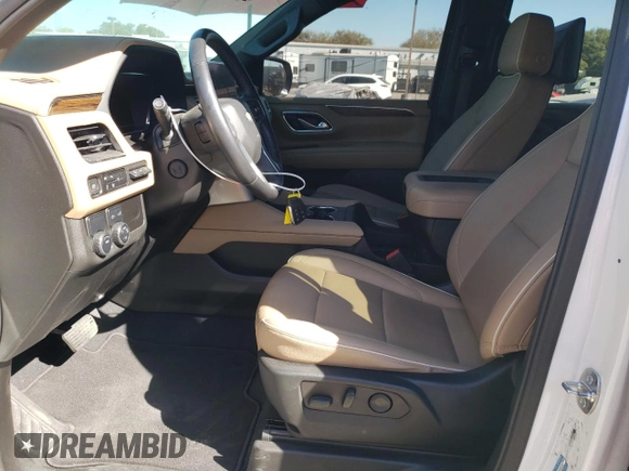 2023 Chevrolet Tahoe Premier with VIN 1GNSCSKD6PR119132, listed as a Copart auction lot 74594664 with 27,716 mi miles and Salvage title. Bid and sale history available at DreamBid. Image 7.