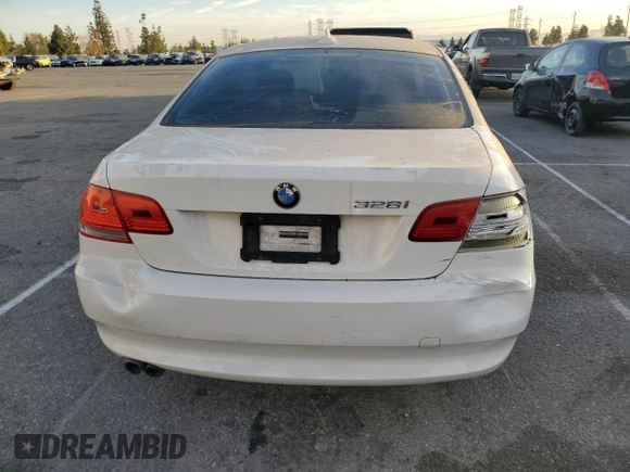 2010 BMW 3 Series 328i with VIN WBAWV1C51AP123918, listed as a Copart auction lot 42458125 with 116,972 mi miles and Clean Title. Bid and sale history available at carsss.com. Image 6.