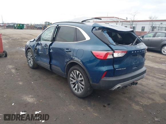 2020 Ford Escape Titanium with VIN 1FMCU9J98LUC00068, listed as a IAAI auction lot 41843755 with 42,525 mi miles and . Bid and sale history available at DreamBid. Image 3.