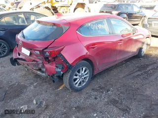 2016 Mazda Mazda3 i Grand Touring with VIN JM1BM1N73G1320541, listed as a IAAI auction lot 41694461 with 87,760 mi miles. Bid and sale history available at carsss.com. Image 4.
