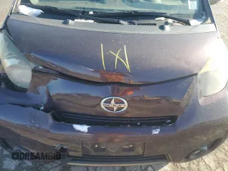 2012 Scion iQ z VIN JTNJJXB00CJ014966, wystawiony jako Copart lot #83100954 z przebiegiem 100 775 mil mil oraz Szkoda całkowita • Salvage title. Historia ofert i sprzedaży dostępna na DreamBid. Obrazek 12.