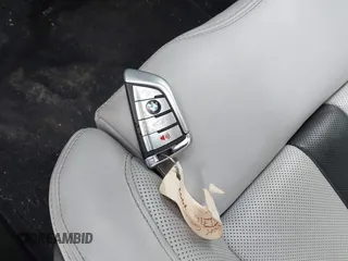 2020 BMW M5 Competition z VIN WBSJF0C00LCD37331, wystawiony jako IAAI lot #41738410 z przebiegiem 49 788 mil mil oraz . Historia ofert i sprzedaży dostępna na DreamBid. Obrazek 11.