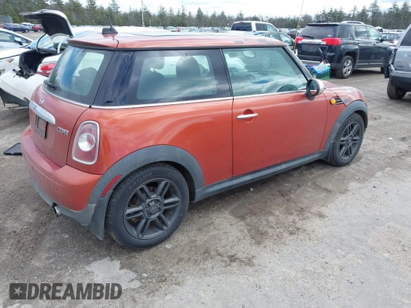 2011 MINI Hardtop with VIN WMWSU3C54BTX96143, listed as a IAAI auction lot 41854987 with 102,743 mi miles and . Bid and sale history available at DreamBid. Image 4.